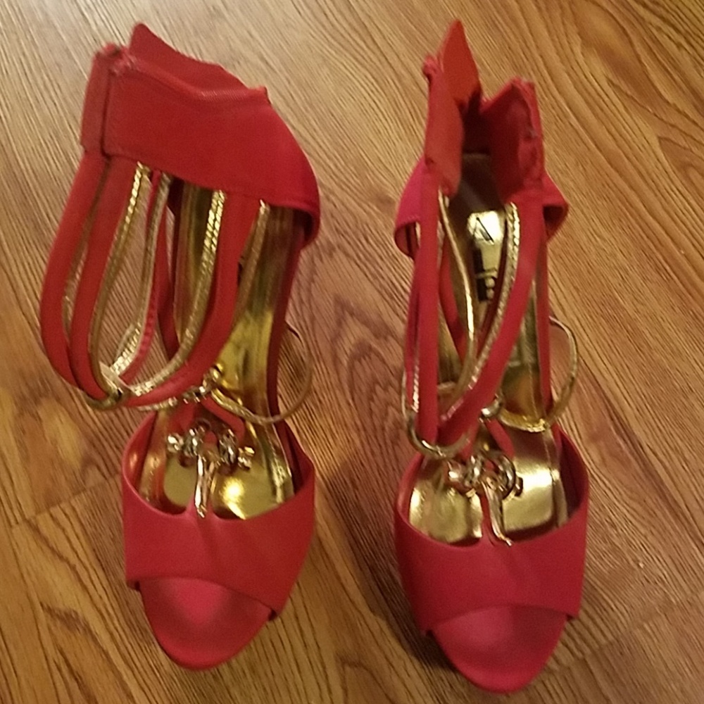 Red and gold high heel shoes